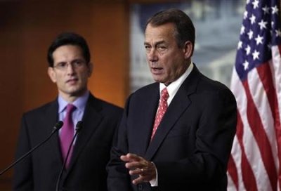 U.S. House Speaker John Boehner (R-OH) and House Majority Leader Eric Cantor (R-VA) joined with other members of their party to sing 'Amazing Grace' the morning of October 15.