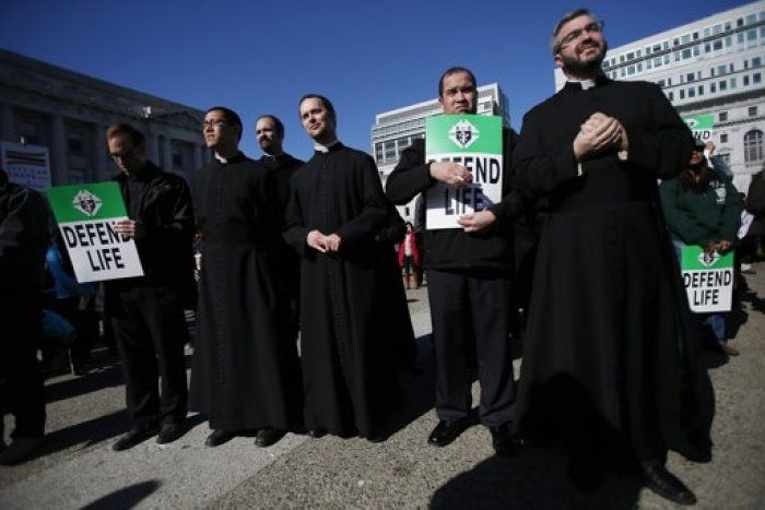 A group of clergymen stand outside City Hall during the Ninth Annual Walk for Life West Coast rally in San Francisco, California, January 26, 2013. Thousands of pro-life demonstrators marched in San Francisco to mark the 40th anniversary of Roe v. Wade U.S. Supreme Court decision legalizing abortion.