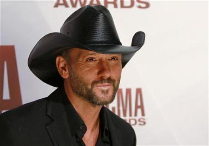 Singer Tim McGraw arrives at the 45th Country Music Association Awards in Nashville, Tennessee, November 9, 2011.