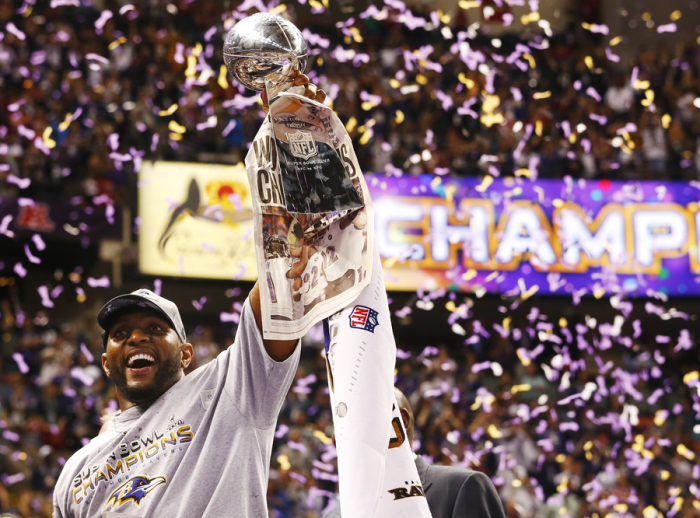 Baltimore Ravens inside linebacker Ray Lewis celebrates with the Vince Lombardi trophy after the Ravens defeated the San Francisco 49ers to win the NFL Super Bowl XLVII football game in New Orleans, Louisiana, February 3, 2013.