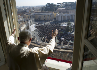 Pope Benedict XVI waves as he leads the Angelus prayer in Saint Peter's square at the Vatican in this picture provided by Osservatore Romano January 27, 2013. Benedict announced Feb. 11, 2013 that he would be retiring at the end of the month, making him the first pontiff to do so in nearly 600 years.
