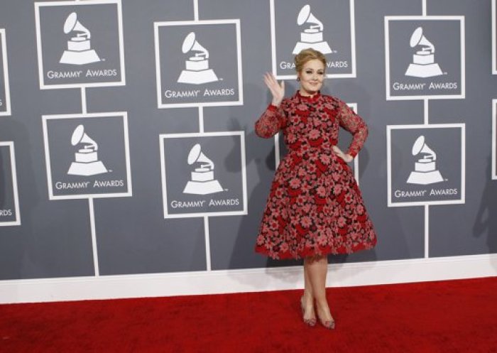 Singer Adele poses as she arrives at the 55th annual Grammy Awards in Los Angeles, California February 10, 2013.