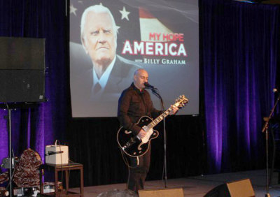 Australian artist Peter Andrew Furler led a time of worship music during the Billy Graham Evangelistic Association breakfast at the National Religious Broadcasters conference held in Nashville on Sunday, March 3, 2013.