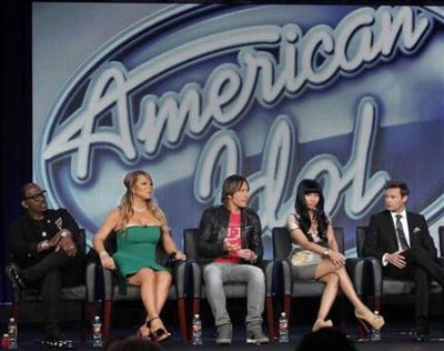 Judges Randy Jackson (L-R), Mariah Carey, Keith Urban, Nicki Minaj and host Ryan Seacrest attend a Fox panel for the television series ''American Idol'' at the 2013 Winter Press Tour for the Television Critics Association in Pasadena, California January 8, 2013.