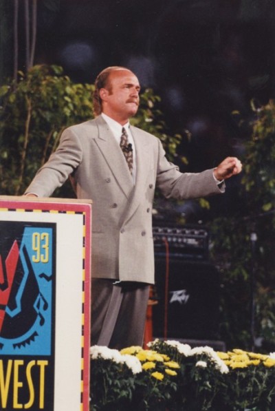 Greg Laurie giving an evangelistic message during a Harvest Crusade in 1993. (FILE)