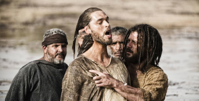 John the Baptist baptizes Jesus in the River Jordan in 'The Bible' episode 3, as seen on The History Channel on Sunday, March 17, 2013.