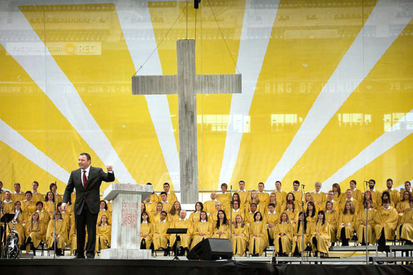 Mars Hill Senior Pastor Mark Driscoll preaches to a crowd of over 17,500 people at the football stadium Qwest field in Seattle, Wash., on Easter Sunday, April 24, 2011.