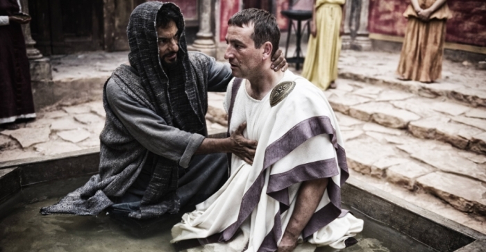 Peter baptizes Cornelius the centurion in The History Channel's 'The Bible' on Sunday, March 31, 2013.