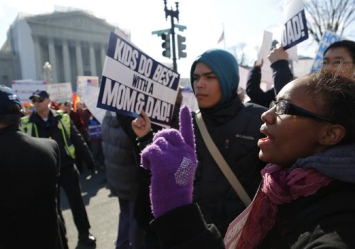Protesters against gay marriage shout slogans in front of the U.S. Supreme Court in Washington, March 26, 2013.
