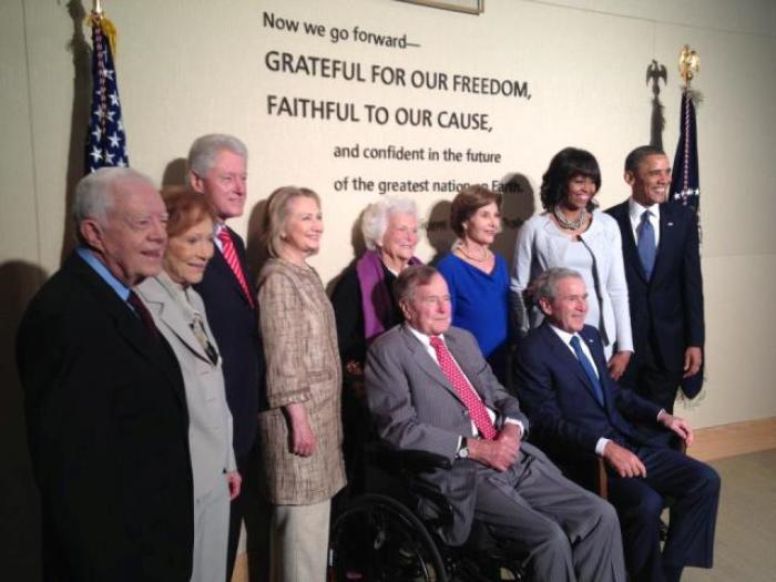 Former Presidents and First Ladies from left: Jimmy and Rosalynn Carter, Bill and Hillary Clinton, George H.W. and Barbara Bush, George W. and Laura Bush, and President Barack Obama an First Lady Michelle Obama, at the dedication ceremony for the George W. Bush Library and Museum on the campus of Southern Methodist University in Dallas, Texas, on April 25, 2013.