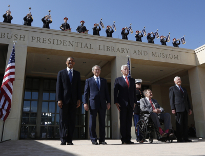U.S. President Barack Obama (L) stands alongside (L-R) former presidents George W. Bush, Bill Clinton, George H.W. Bush and Jimmy Carter as they attend the dedication ceremony for the George W. Bush Presidential Center in Dallas, April 25, 2013.