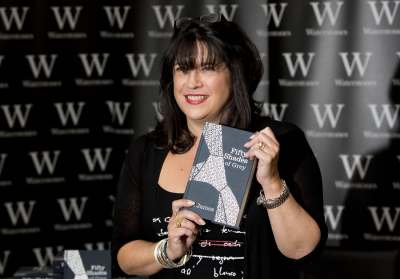 E L James, author of Fifty Shades of Grey, poses for photographers during a book signing in London September 6, 2012.