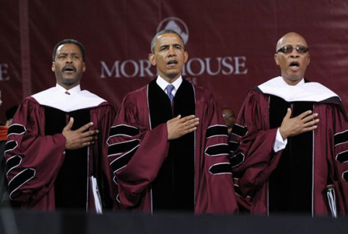 U.S. President Barack Obama (C) attends the graduation ceremony of the class of 2013 at Morehouse College in Atlanta, Georgia, May 19, 2013. With Obama are College President John Wilson (L) and Chairman of the Board of Trustees Robert Davidson.