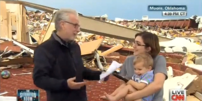 Wolf Blitzer has asked an atheist whether she thanked the lord after surviving the Oklahoma tornado.