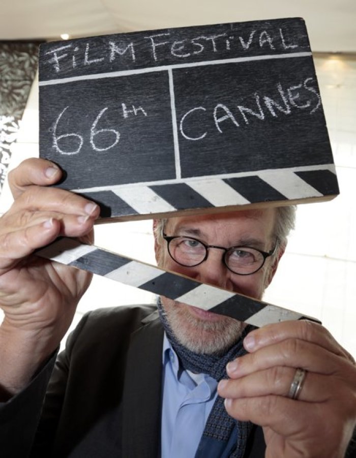 Director Steven Spielberg, President of the 66th Cannes Film Festival, holds a director's clap on the eve of the opening of the Festival in Cannes May 14, 2013. The 66th Cannes Film Festival will run from May 15 to May 26.