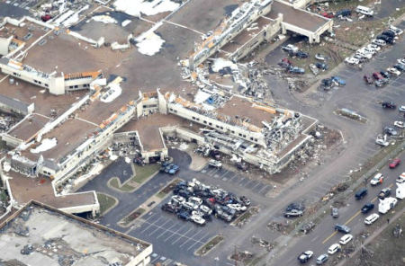 An aerial view of damage at Moore Medical Center in Moore, Okla., is seen on May 21, 2013, in the aftermath of a tornado that killed at least 24 people and injured hundreds of others. None of the 25-30 people at the center were harmed by the storm.