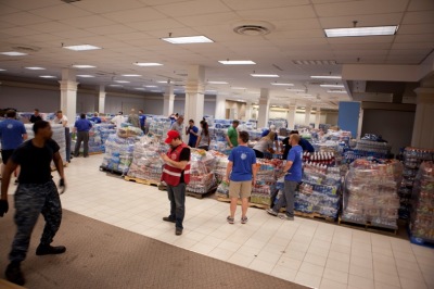 Much of the water, food, and supplies provided to survivors of the tornado in Moore, Okla., are being distributed through the help of men in the Salvation Army's Adult Rehabilitation Center program, May 2013.