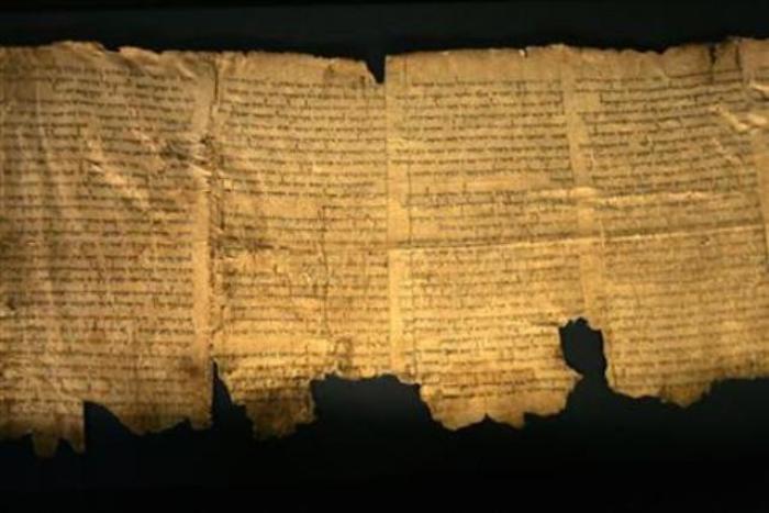 Sections of the ancient Dead Sea scrolls are seen on display at the Israel Museum in Jerusalem May 14, 2008.