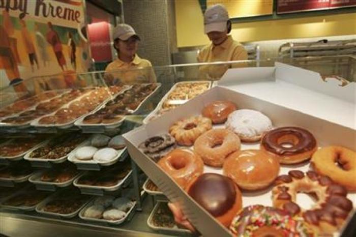 A variety of doughnuts is displayed at new the Krispy Kreme store in Tokyo December 12, 2006.