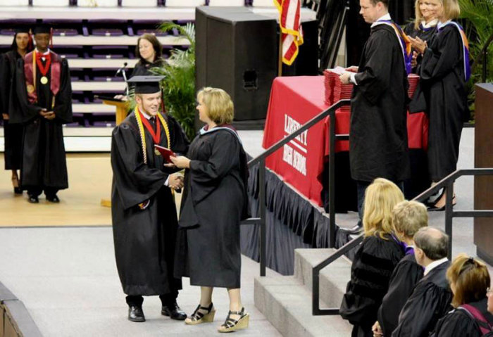 Roy B. Costner IV received his diploma from Liberty High School Principal Lori Gwinn, who described him as one who 'dreams big, encourages others, and creates his own path.' June 1, 2013.