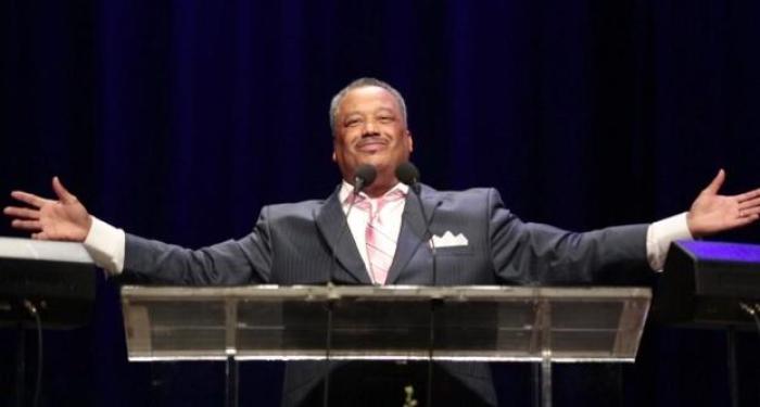 Fred Luter, Jr., Southern Baptist Convention president, delivers a message of revival to more than 4,400 people attending the annual SBC conference, June 11, 2013.