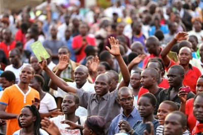 Kenyans worship while attending the men's conference at the Will Graham Celebration of Peace event, which took place June 7-9 at the Jomo Kenyatta Sports Ground in Kisumu, Kenya.