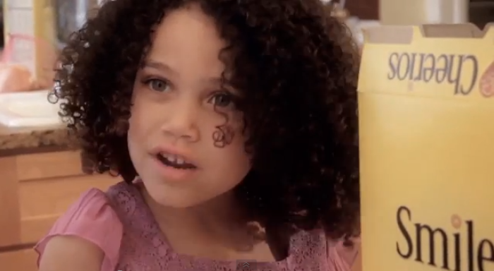 A biracial girl in a spoof of the controversial Cheerios ad.