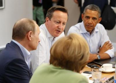 Germany's Chancellor Angela Merkel, Russia's President Vladimir Putin, Britain's Prime Minister David Cameron and U.S. President Barack Obama attend a working session at the Lough Erne golf resort where the G8 summit is taking place in Enniskillen, Northern Ireland, June 18, 2013.
