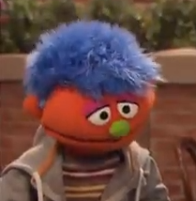New Sesame Street character deals with children who have parents in prison.