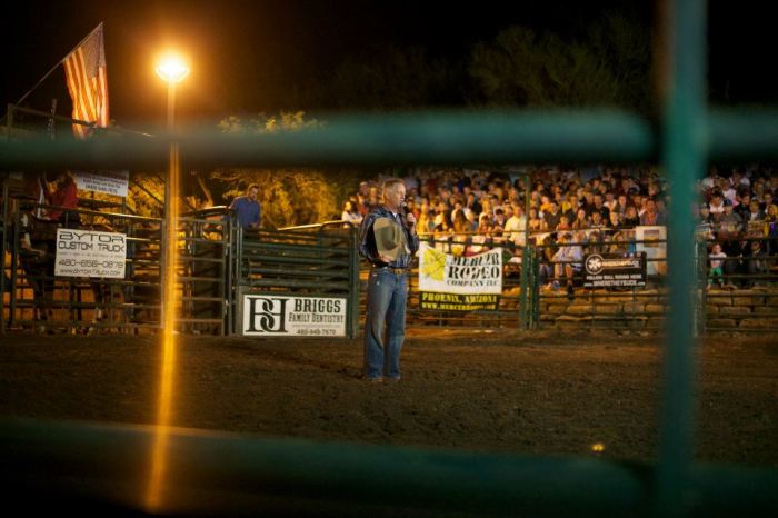Pastor Steve Gilbertson of Ecclesia Church popularly known as 'Church at the Chip' in Cave Creek, Ariz., prays at the rodeo behind the Buffalo Chip Saloon where he keeps church services every Sunday.