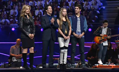 Lakewood Church Pastor Joel Osteen his wife, Victoria, and their children Jonathan (18) and Alexandra (14), speak at the Hillsong Conference July 3, 2013, in Sydney, Australia.