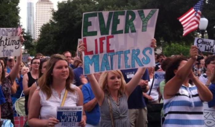 Supporters of legislation in Texas that would ban abortion after 20-weeks gestation gather outside the capitol during the Stand4Life pro-life rally in Austin, Texas, on Monday, June 8, 2013.