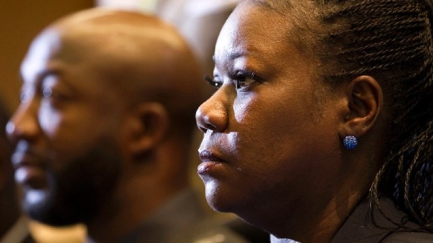 Trayvon Martin's mother, Sybrina Fulton and father Tracy Martin (background).