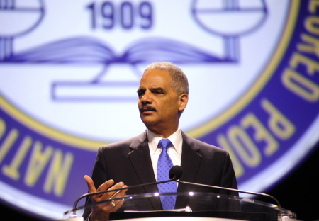 U.S. Attorney General Eric Holder speaks at the annual convention of the National Association for the Advancement of Colored People (NAACP) in Orlando July 16, 2013. Holder told the major civil rights convention that controversial "Stand Your Ground" self-defense laws that have been adopted in 30 states should be reconsidered.