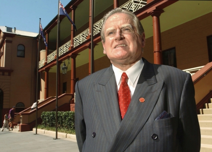 New South Wales legislative council member Rev. Fred Nile stands outside the enterance of the state parliament house in Sydney on Nov. 22, 2002. Nile's call for a ban on Muslim women wearing a traditional head-to-knee gown in public because they could be used to conceal weapons has sparked outrage in Australia.
