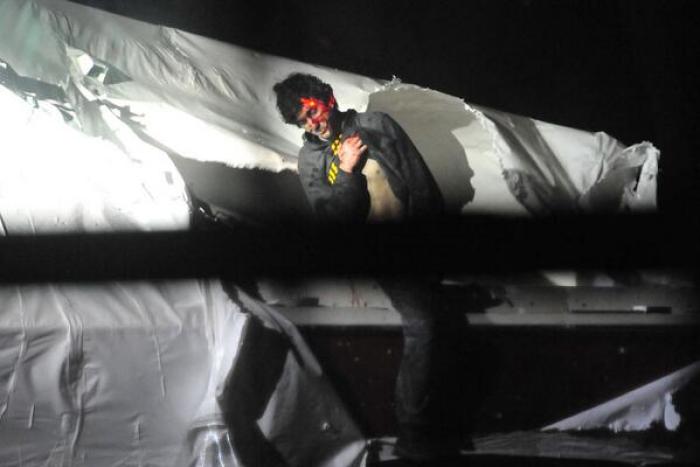 Tsarnaev, collapsed right before capture, with a sniper's laser on head.