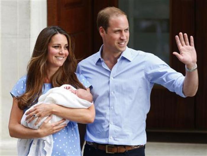 Prince William and Kate Middleton appear with their baby son outside of St Mary's Hospital in central London on July 23, 2013.