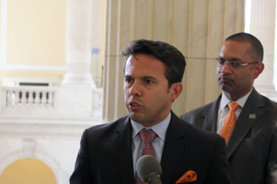 Rev. Samuel Rodriguez (L), president of the National Hispanic Christian Leadership Conference, and Ali Noorani (R), director of the National Immigration Forum, at a press conference on immigration reform, Washington, D.C., July 24, 2013.