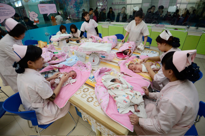 Chinese infants undergo a daily medical examination at a maternal and child health care hospital in Taiyuan, Shanxi province.