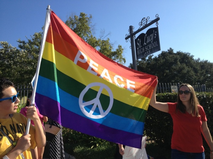 Students at an all-girls Catholic high school in Glendora, Calif., attended a rally in support of a gay teacher who was fired after photos of his same-sex wedding were published in a local newspaper, Aug. 8, 2013.
