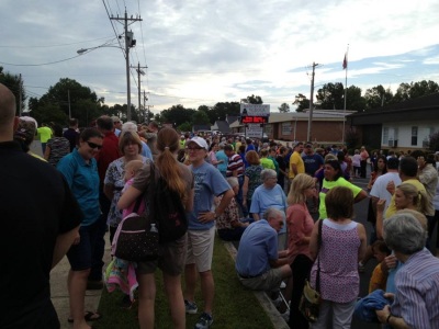 The street next to a school in the Cullman County School District in Alabama is packed with people participating in an annual prayer caravan held before the beginning of the new school year, Aug. 10, 2013.