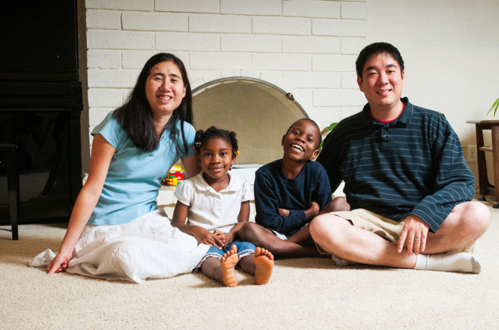 Matthew and Grace Huang with their adopted children.