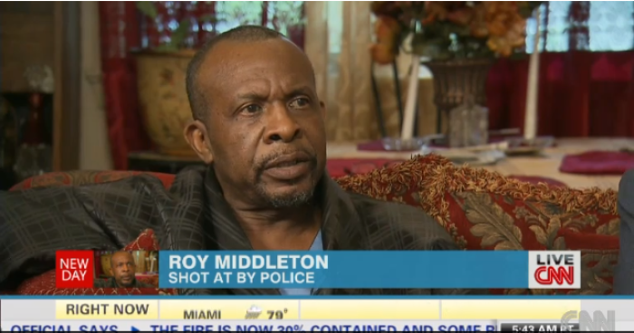 Cops missed 13 times after firing 15 shots at 60-year-old Roy Middleton as neighbors mistook him for car thief.