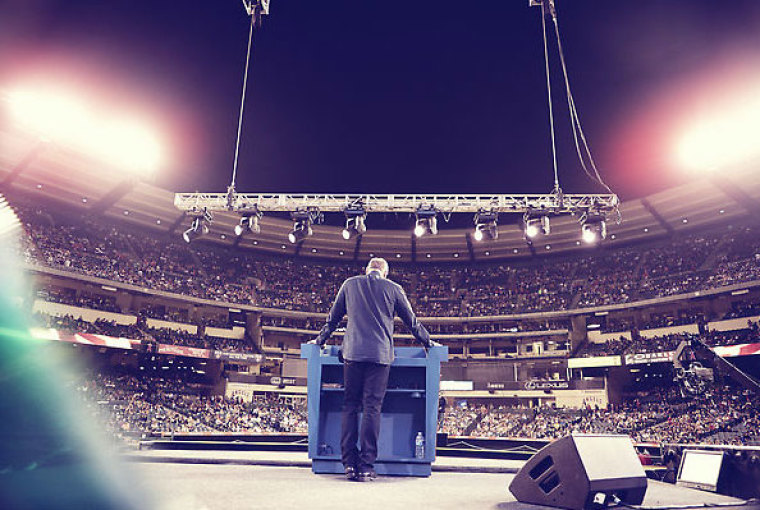 Evangelist and pastor Greg Laurie preaches at the SoCal Harvest event at Angel Stadium Friday, August 23, 2013, in Anaheim, Calif.