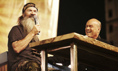 Phil Robertson (l) of A&E's 'Duck Dynasty' fame and Greg Laurie (r), founder of Harvest Ministries, at the Harvest SoCal event on Sunday, Aug. 25, 2013, in Anaheim, Calif.