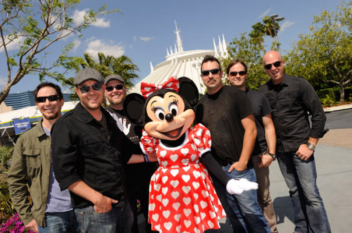 Christian Rock band MercyMe poses with Minnie Mouse at Walt Disney World, in preparation of their 'Night of Joy' concert next Friday, September 6.
