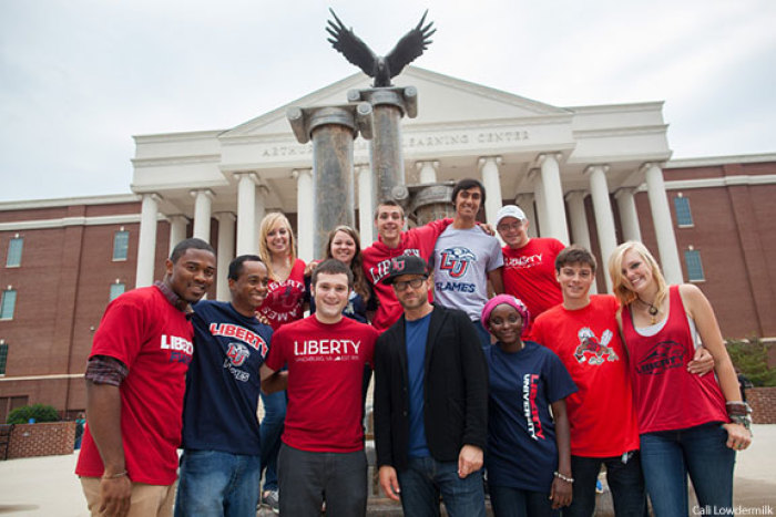Award-Winning artist TobyMac poses with students at his alma mater, Liberty University, which he visited Wednesday to pay tribute to the school for its sponsorship of his upcoming tour.