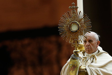 Pope Francis blesses during a prayer calling for peace in Syria, at St. Peter's Square at the Vatican September 7, 2013. A sombre-looking Pope Francis made an impassioned appeal before 100,000 people on Saturday to avert a widening of Syria's conflict, urging world leaders to pull humanity out of a 
