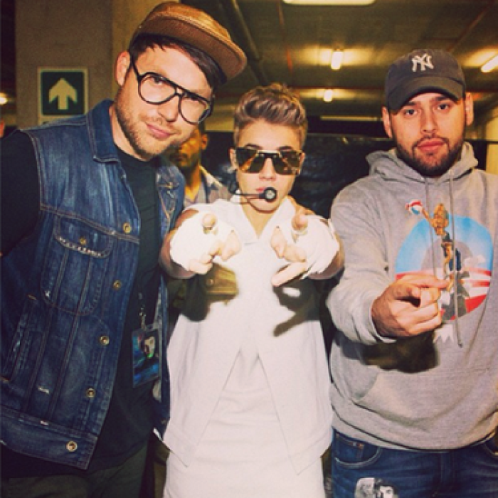 Justin Bieber with Scooter Braun and Judah Smith.