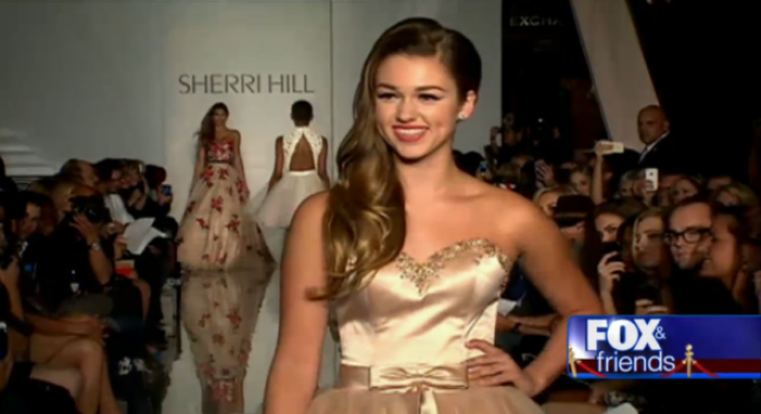 Sadie Robertson, the daughter of Willie and Kori Robertson of 'Duck Dynasty' fame, walks down the runway in the Sherri Hill fashion show at Trump Tower during New York Fashion Week in New York City, N.Y., on Sept. 9, 2013.